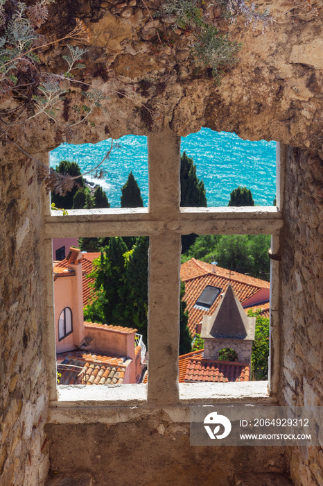 View of the church from the window of the fortress of the ancient castle in Roquebrune-Cap-Martin, F