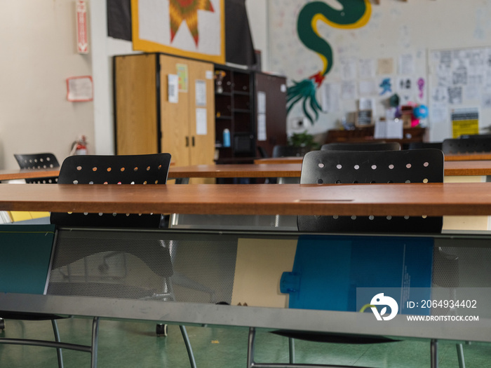 Empty classroom with a colorful background