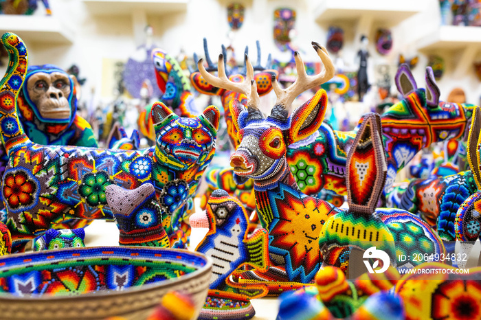 Traditional huichol bead ornament figures mexican culture