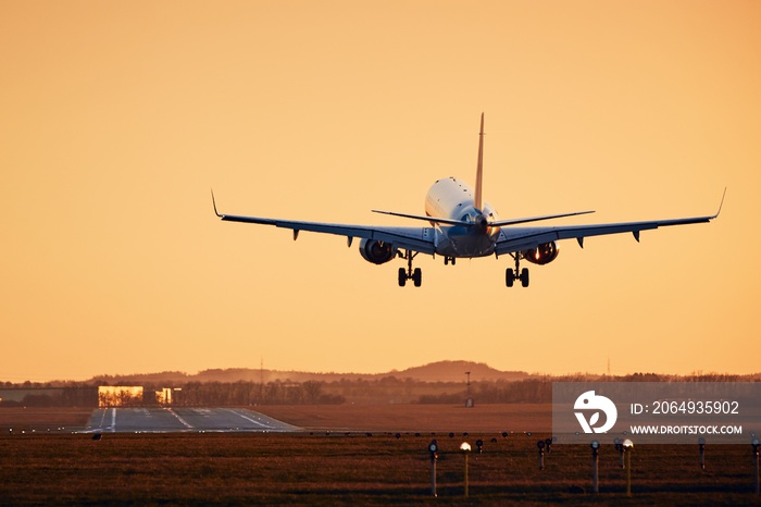 Airplane landing on runway