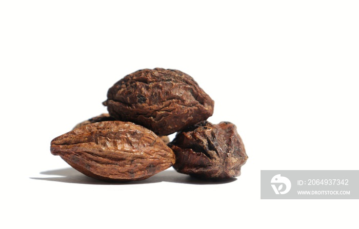 Closeup of Dry Terminalia Chebula or Haritaki Fruit Isolated on White Background with Copy Space, Al