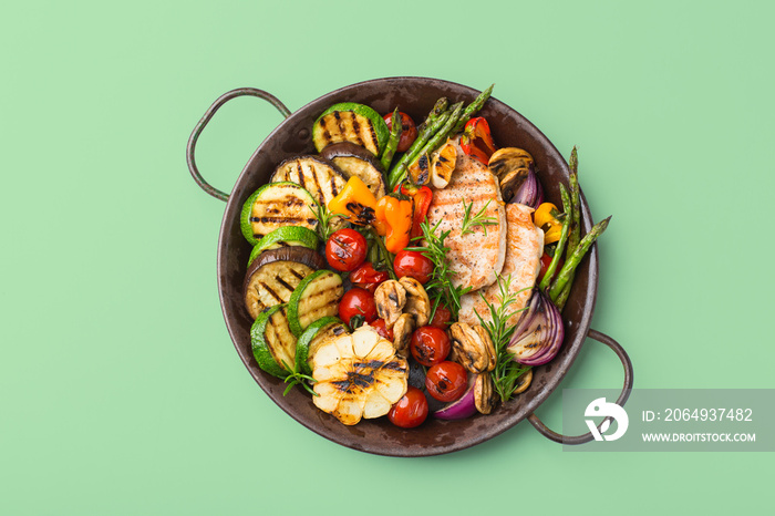 Seasonal summer grilled vegetables and chicken in a pan