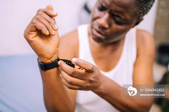 Queer masculine woman wearing a watch