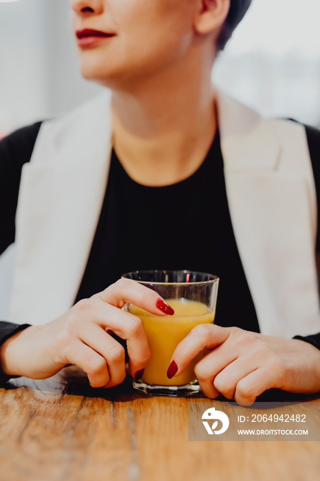 Woman drinking orange juice