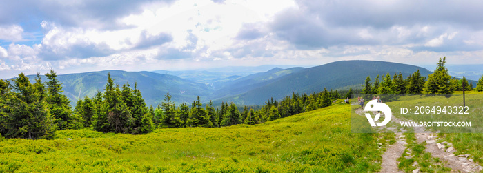 Tourists with backpacks on the trail, mountain hostel, Snieznik Mountains, Kralicky Sneznik, Miedzyg