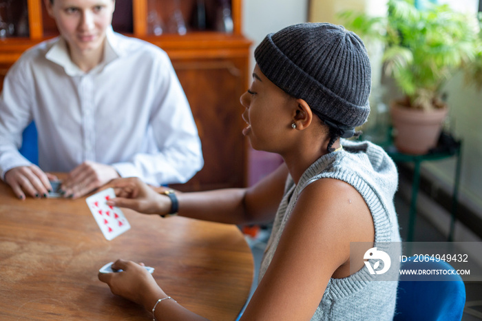 People playing cards at home�