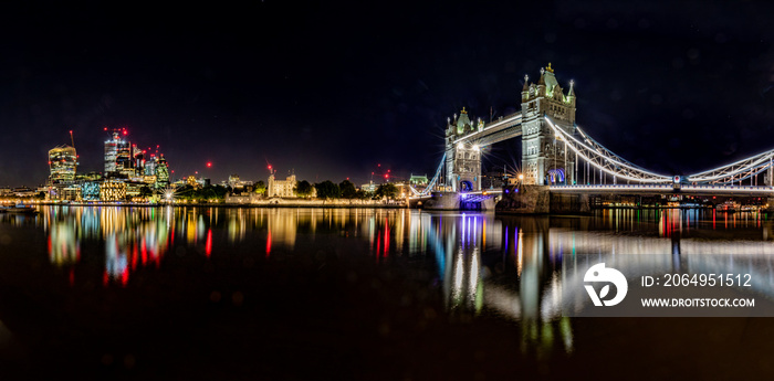 Tower Bridge and the River Thames in London England with a reflection of the bridge and the Tower of