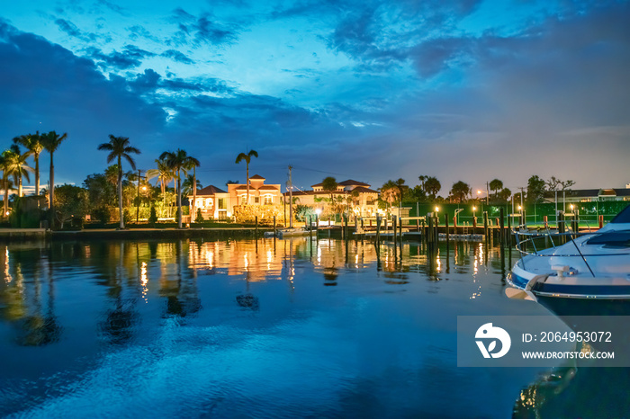 Boca Raton buildings along Lake Boca Raton at sunset, Florida