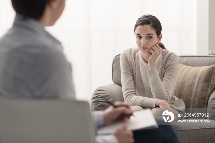 Psychologist listening to her patient