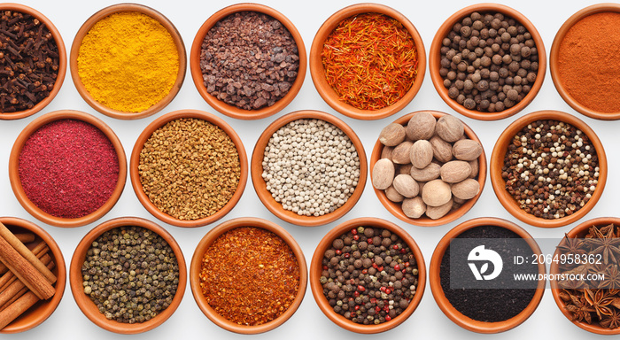 Different kinds of spices on white background