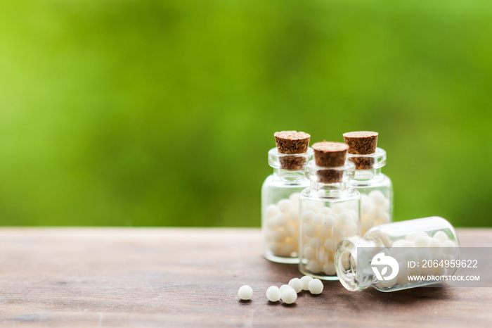 Homeopathy pills in vintage bottles