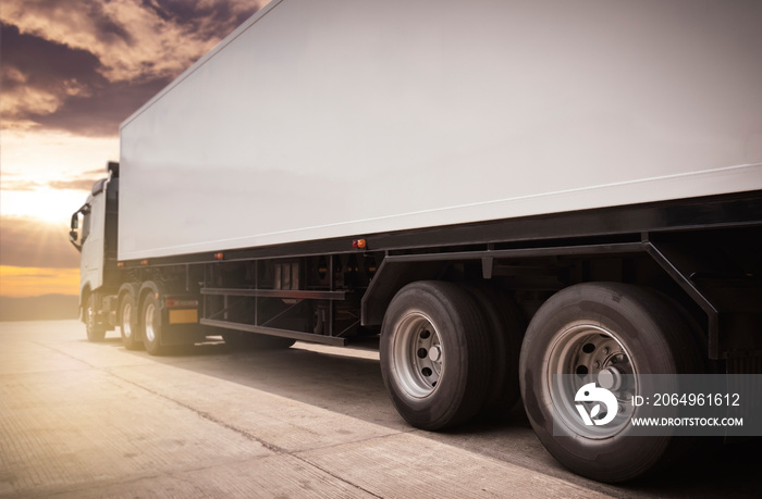 Semi TrailerTrucks Parked with Sunset Sky. Shipping Container Trucks. Truck Wheels Tires. Engine Die