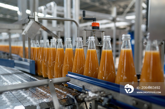 Juice factory, product line, peach juice bottle on the product line