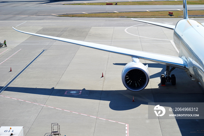 Airplane getting ready at terminal