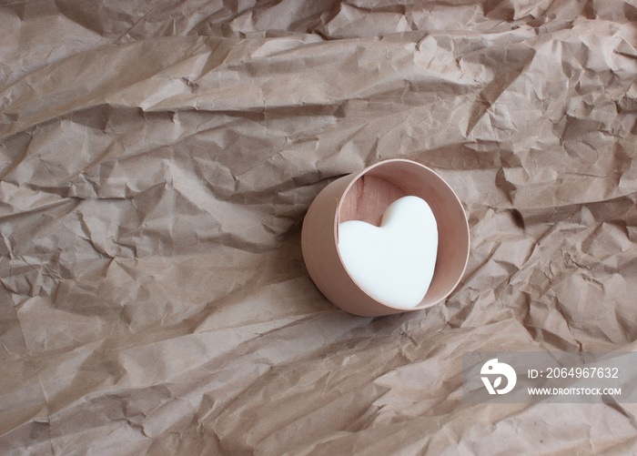 Eco-friendly disposable packaging,   plastic free lifestyle. On a paper background - a round birch b