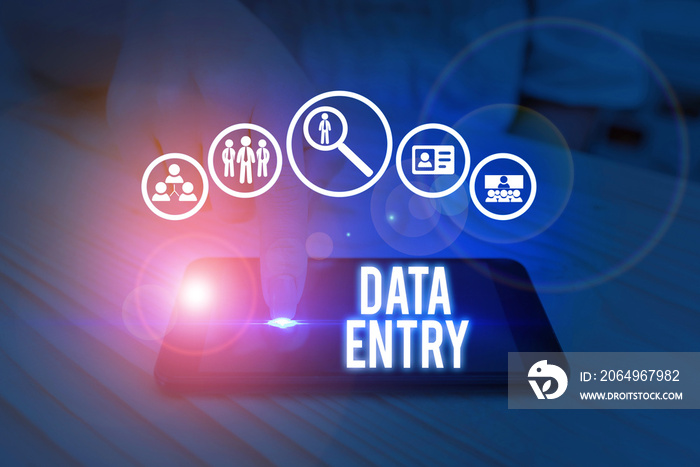 Writing note showing Data Entry. Business concept for process of inputting data or information into 