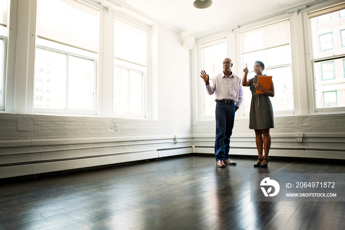 Man talking with real estate agent