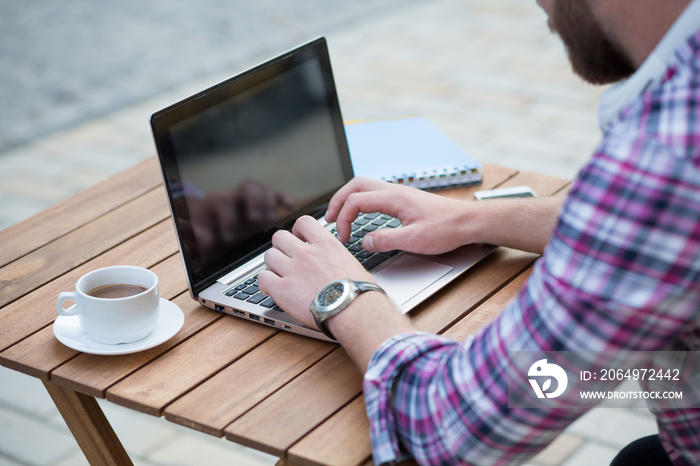 Man freelancer with laptop