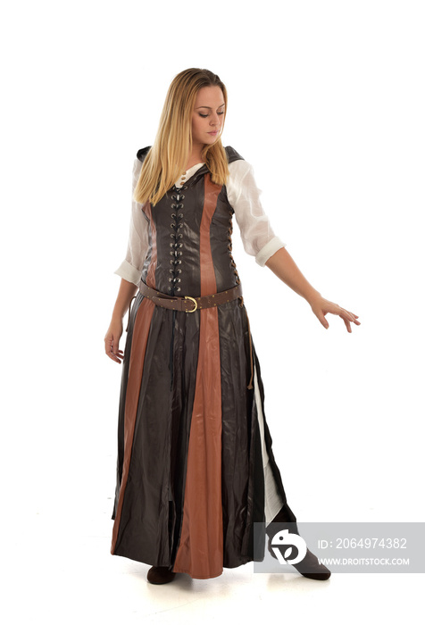 full length portrait of girl wearing brown  fantasy costume. standing pose on white studio backgroun