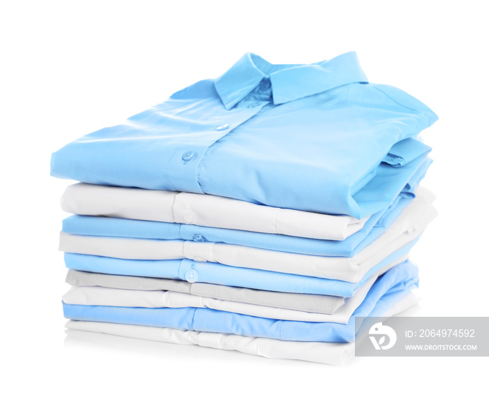 Stack of clothes on white background, closeup