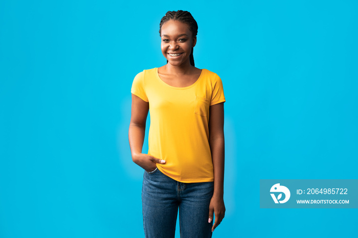 African Millennial Woman With Brackets Smiling Standing Over Blue Background