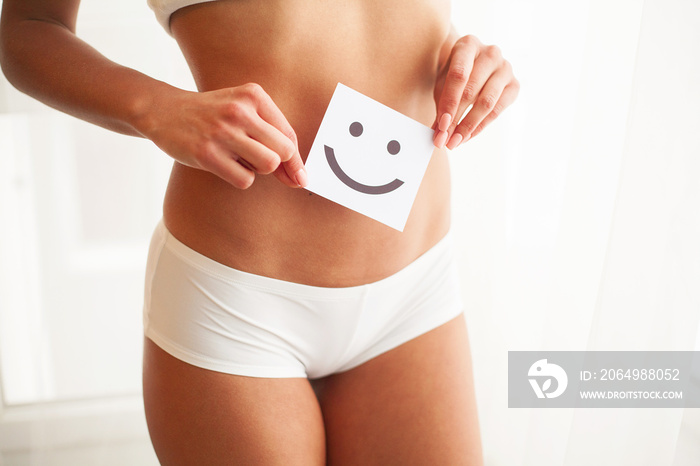 Women Health. Beautiful Female Body In Panties With Smile Card