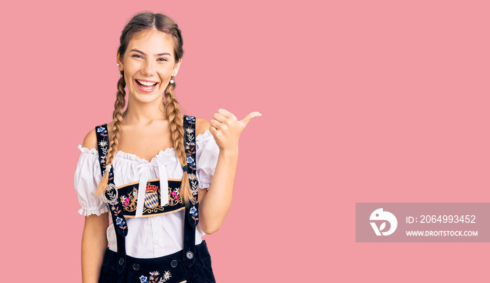 Beautiful caucasian woman with blonde hair wearing octoberfest traditional clothes smiling with happ