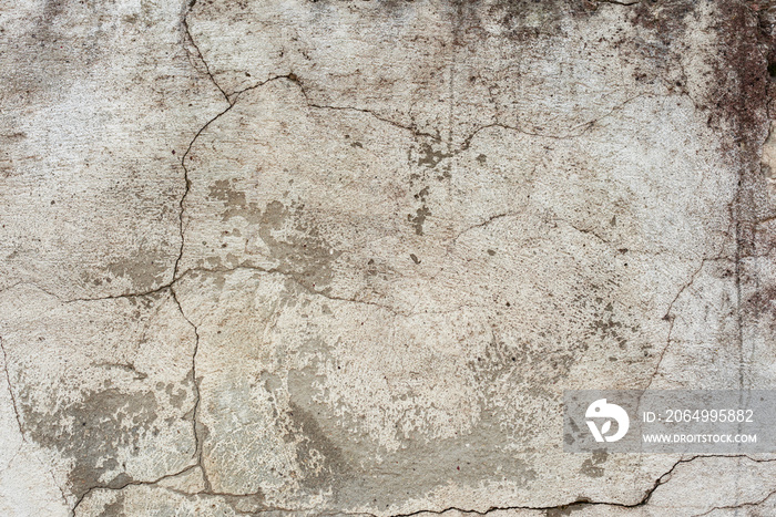 Texture of a concrete wall with cracks and scratches which can be used as a background