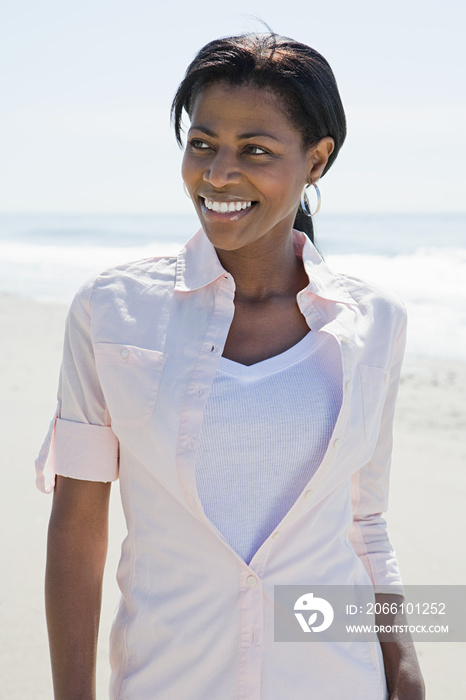 Smiling woman on a beach