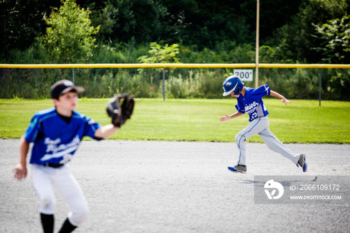 Young baseball players in playing field