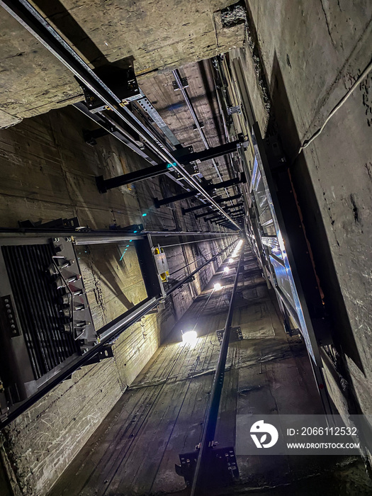 Looking up a lift (elevator) shaft in an apartment building