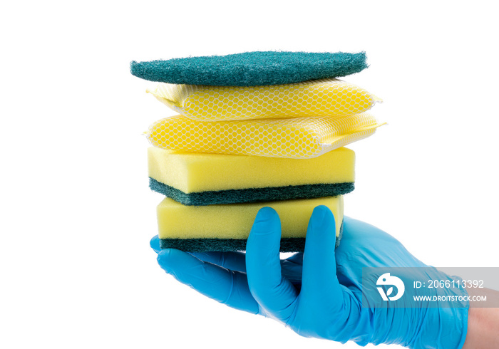 Wearing blue gloves, holding cleaning supplies, kitchen utensils on a white background