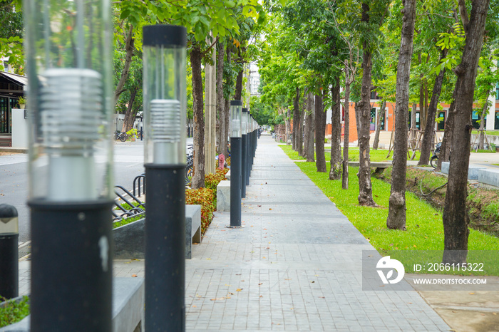 light pole with footpath with in university campus or public park.;