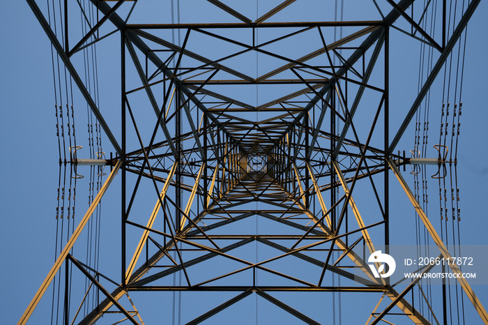 Electricity Pylon carrying electric power across the united kingdom. Large steel tower high above th