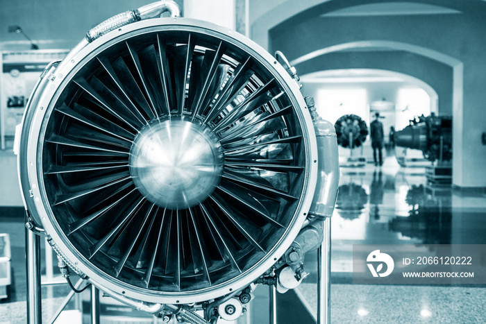 Aviation Technologies. Aircraft jet engine detail in the exposition. Blue colored