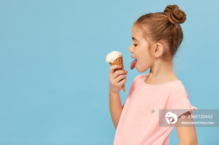 happy little girl eating ice cream