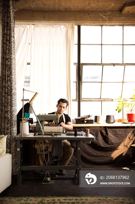 Tailor working in workshop