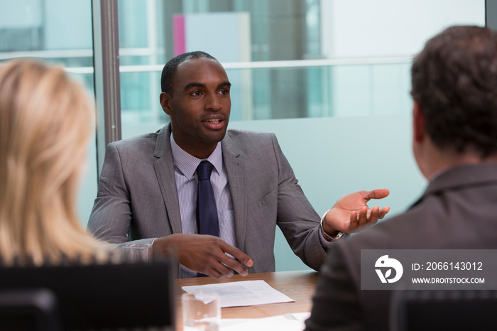 Businessman talking in job interview