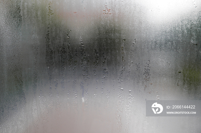 Water drop on glass windows background