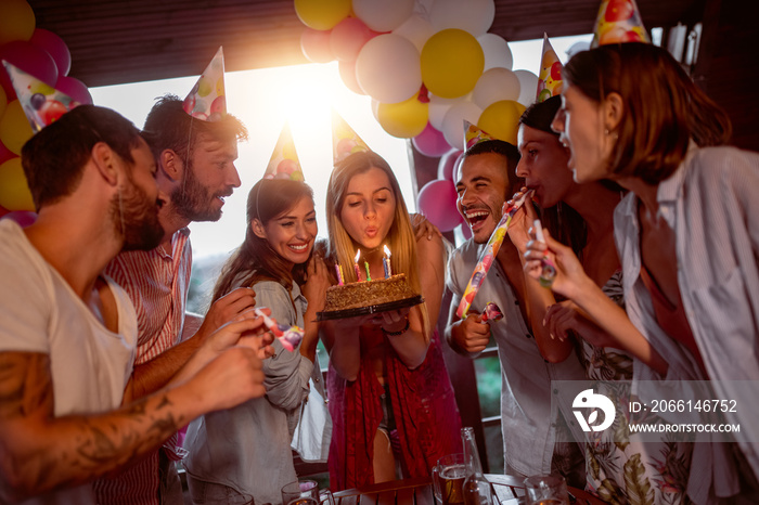 Group of friends celebrating birthday together