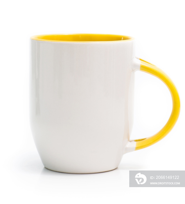 white cup with a yellow handle