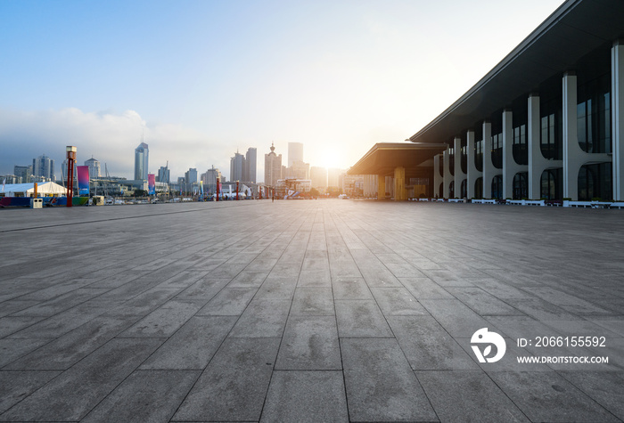 Empty square ground and modern buildings in Qingdao, China