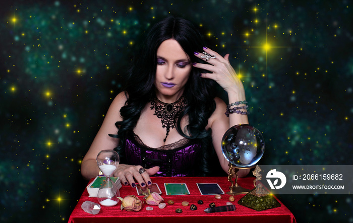 Psychic with crystal ball and tarot cards Bright Galaxy Background