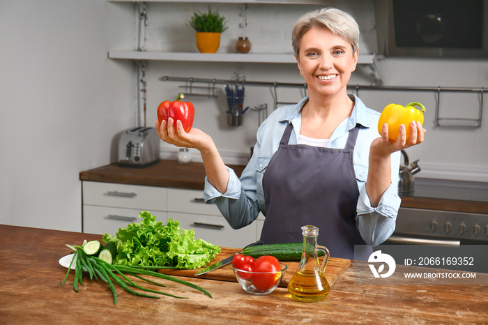 Mature woman cooking in kitchen