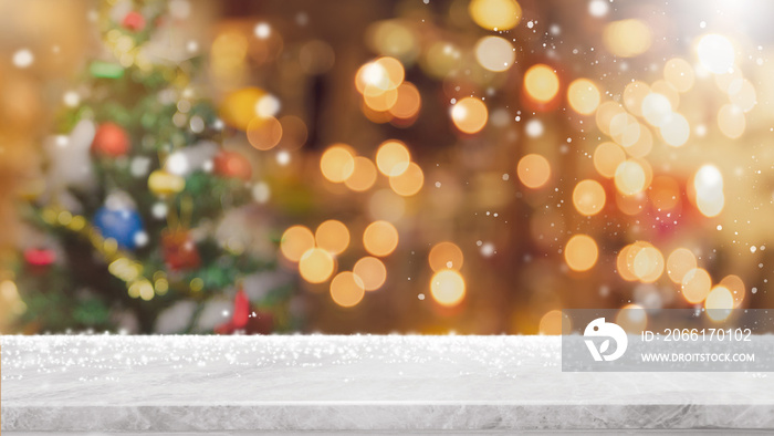 Empty white marble stone table top with bokeh light on blurred Christmas tree banner background with