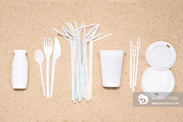 Disposable single use plastic objects such as bottles, cups, forks, spoons and drinking straws that 