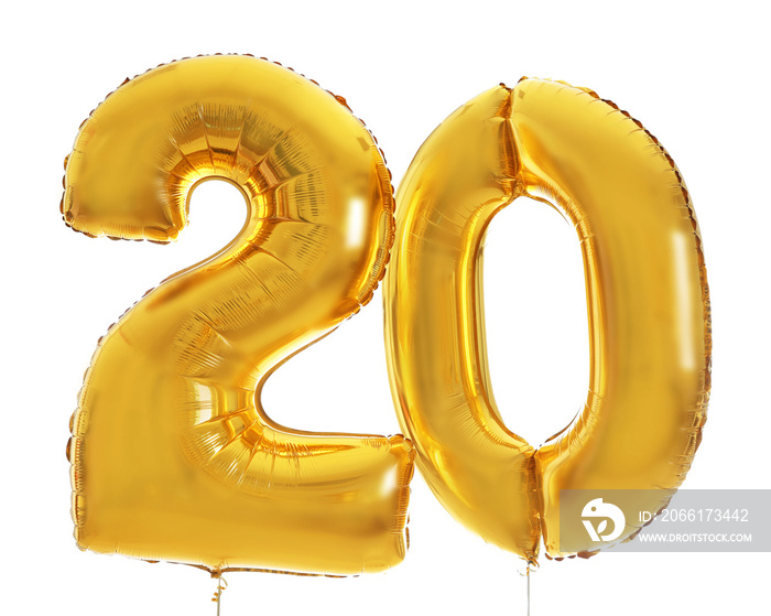 Golden birthday balloons on light background