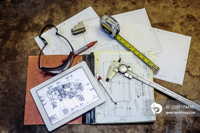 Measuring equipment and tablet on table