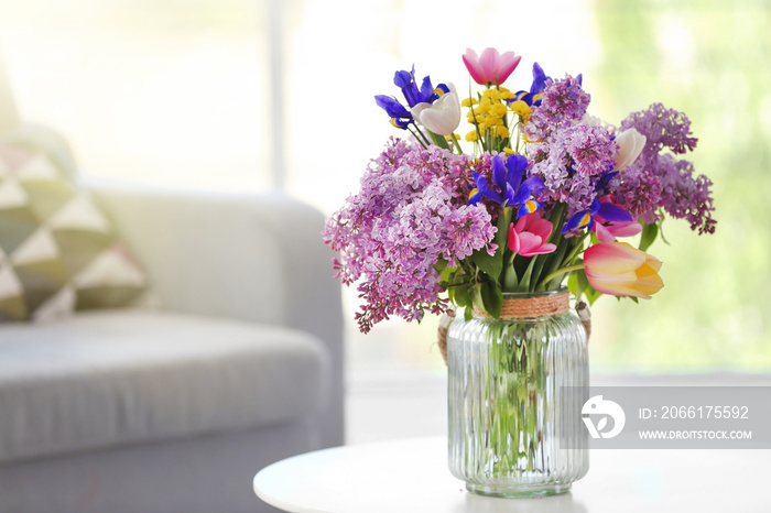 Bouquet of fresh spring flowers in the room