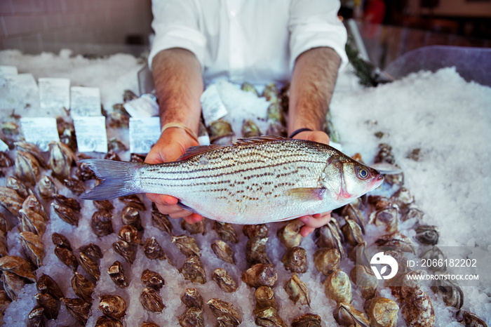 Mid-section of fish vendor